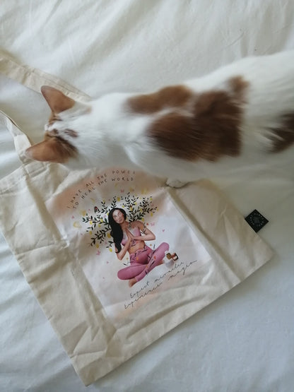 Sammie loves the SHE Heals the World Tote Bag!